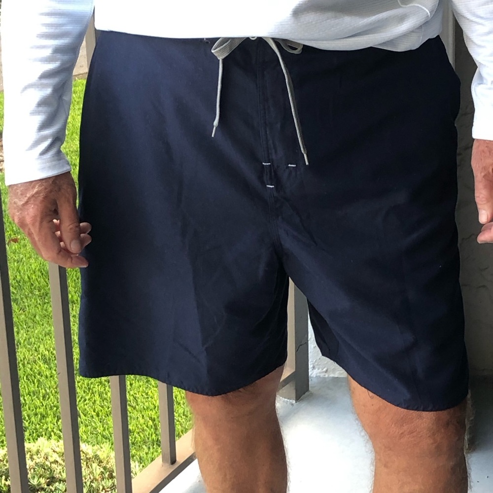 NWOT Men’s Swim Trunks with draw string, 2 external pockets & great detailing
